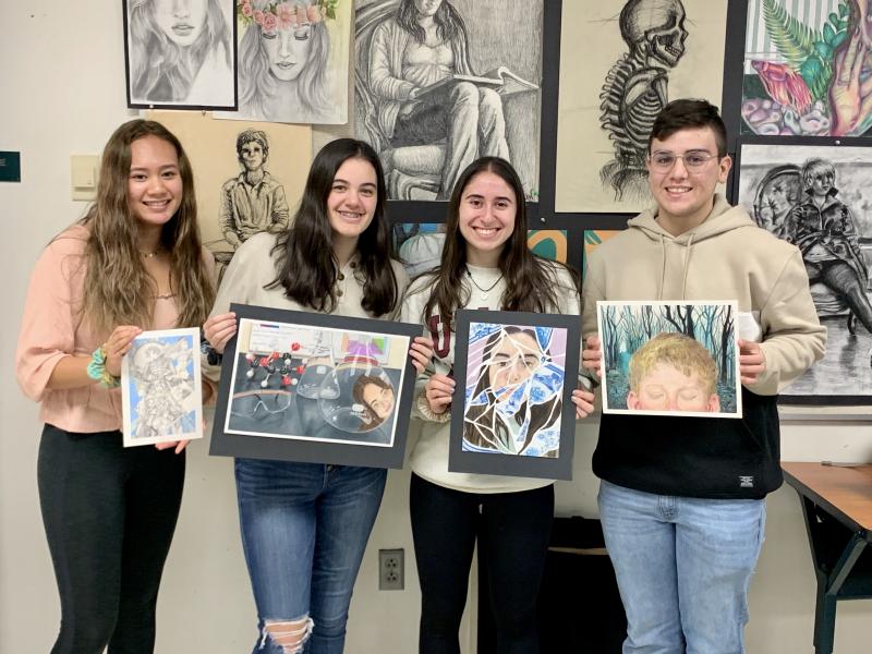 Dartmouth, MA - Dartmouth High School students Jaffa Heryudono, Sophia Leavitt, Julia Klein, and Tony DaCosta with their artwork. Photo courtesy: Judy Cronin